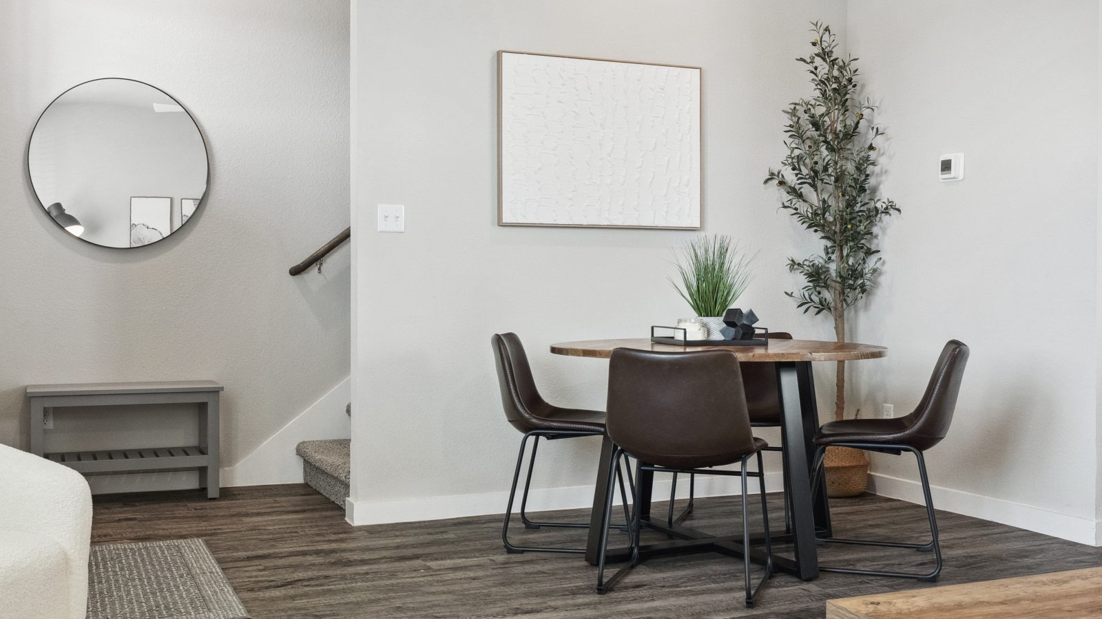 a dining room with a table and chairs at The  Powell